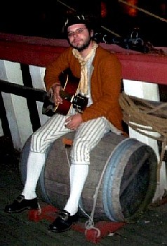 Man Sitting on the Ship's Communal Water Cask